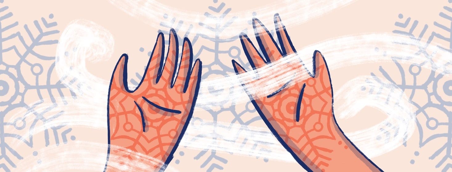 Two hands, palm facing up, red and inflamed with the plaque pattern making a snowflake design. There are cold wind gusts blowing through the hands. In the background, there is a snow and winter design