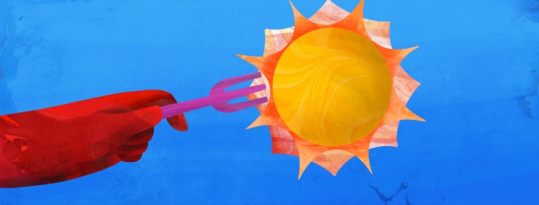 A hand is holding a fork with the sun attached to it in front of a bright blue sky.