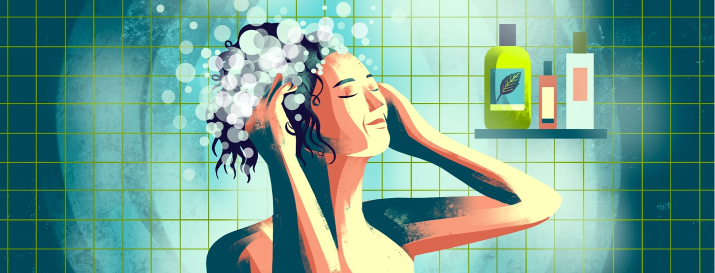 alt=a woman is soothed by washing her scalp with a menthol shampoo.