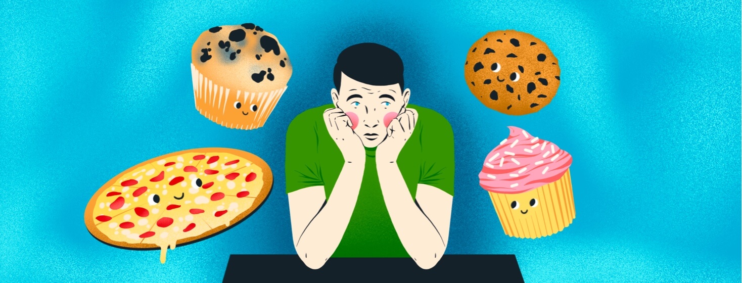alt=a man going gluten-free looks depressed, surrounding by pizza and baked goods